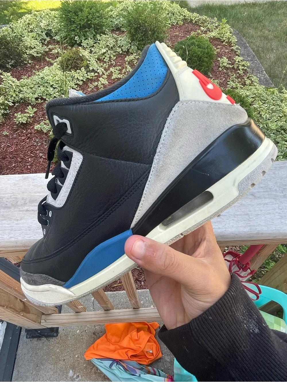 Black and Blue Retro Basketball Sneaker with Red Accent